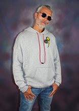 Load image into Gallery viewer, This new happy face grey hoodie offers a casual, relaxed fit for everyday wear.  Oversized fit. Raw seams at shoulders and pocket. Oversized kangaroo pocked.  52% Airlume combed and ring-spun cotton, 48% poly fleece.   
