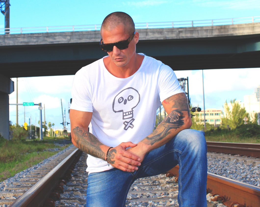 An elevated raw neck detail on this men triblend t shirt for our collection exclusive adds just the right amount of cool to this shirt.   Side-seamed. Unisex sizing. Raw neck. Retail fit.  50% Polyester, 25% Airlume combed and ring spun cotton, 25% Rayon